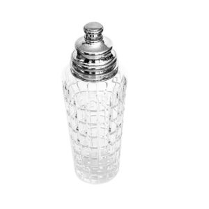 Crystal cocktail shaker with silver top.