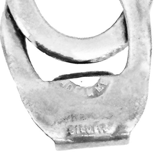 Silver bottle opener with engraved text.
