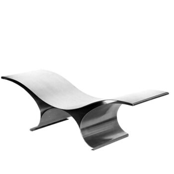 Sleek, modern black and white lounge chair with smooth curves.